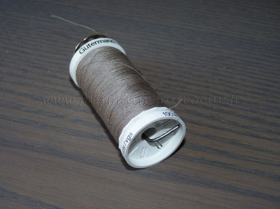 Thread and bobbin held together