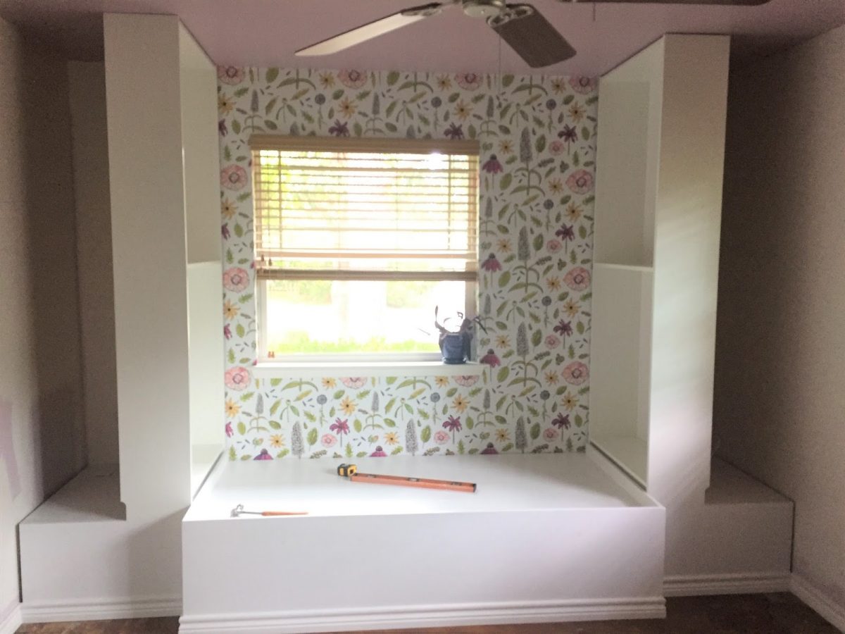 Daybed reading nook with IKEA bookshelves