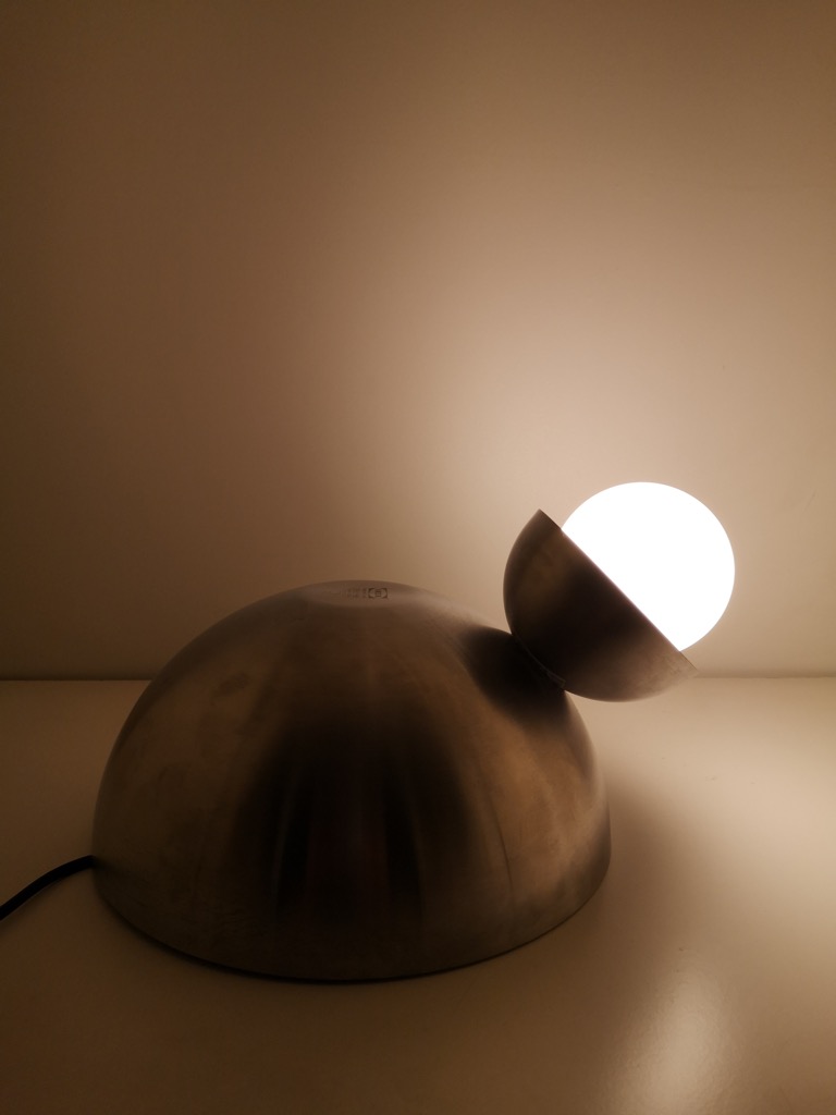 Light up with this cute table lamp made from serving bowls