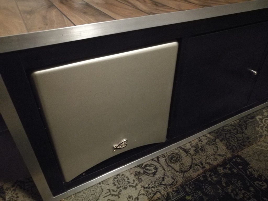 A discreet subwoofer cabinet in a KALLAX unit