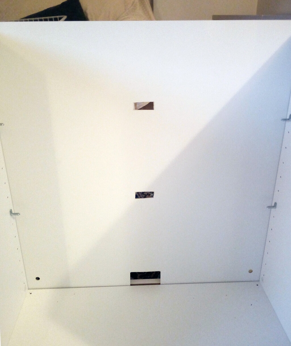 White TV stand with pretty hexagon patterns
