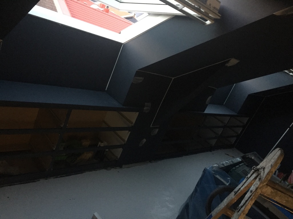 Stylish loft storage with customised built-in IKEA chests