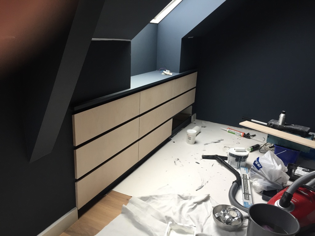 Stylish loft storage with customised built-in IKEA chests