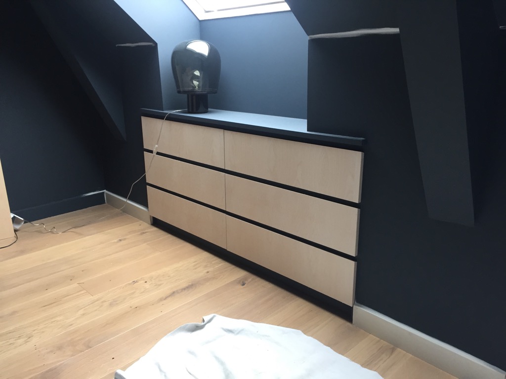 Stylish loft storage with customised built-in IKEA chests