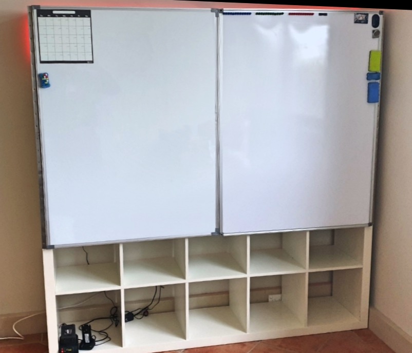 KALLAX storage unit with whiteboard doors